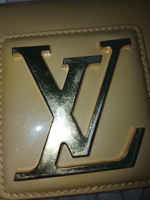 Louis Vuitton Sobe Clutch