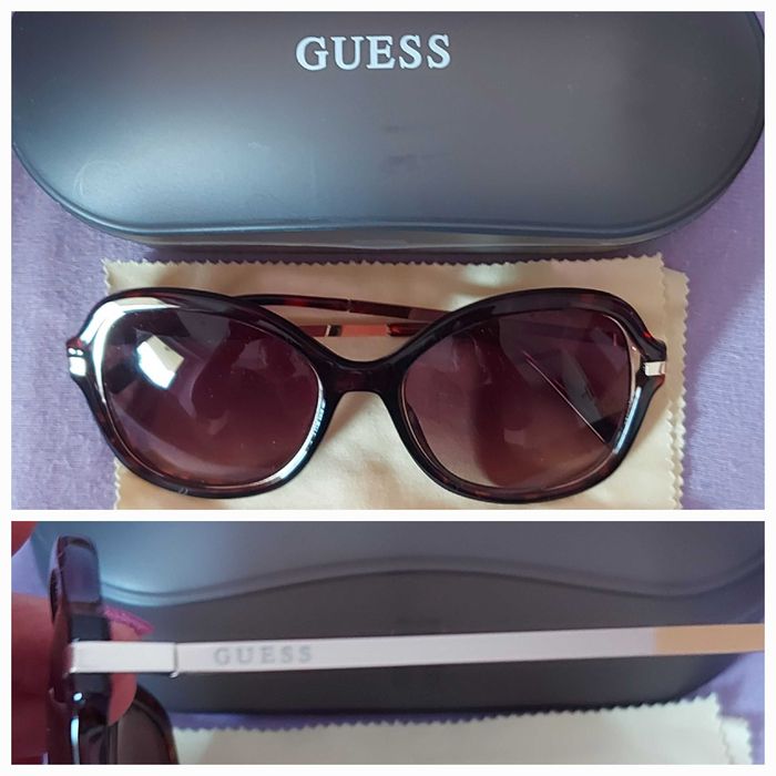 Слънчеви очила Guess,  носени, без забележка.