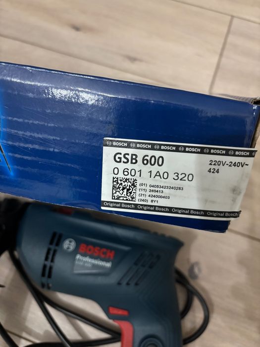 M asina de gaurit si insurubat cu fir cu percutie Bosch GSB600, 600 W