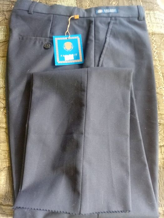 Продам брюки новые