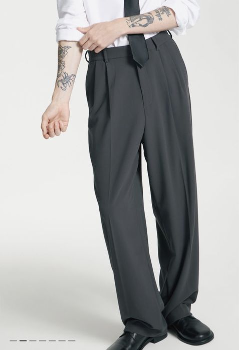 Широкие брюки с защипами