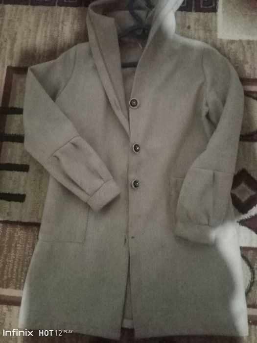 kiyilgan kalta kardigan xolati yangi