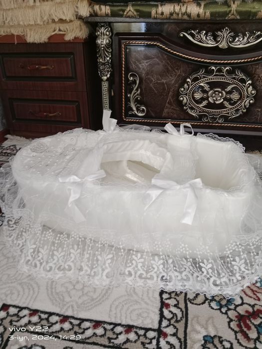 Raddomdan chaqaloq olib chiqish uchun savat