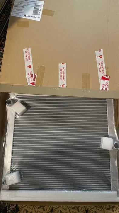 Радиатор BMW E70