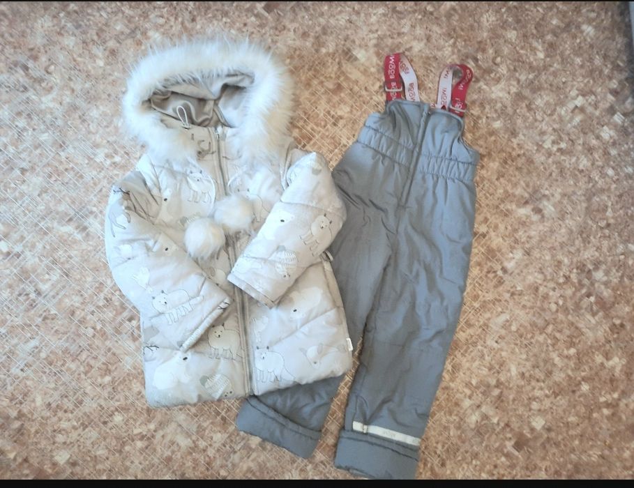 Продам зимний комбинезон на девочку