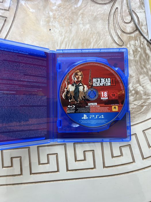 Диск RDR2 для PS4/PS5 в отличном состоянии