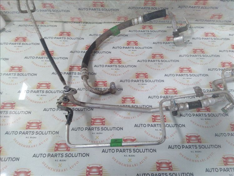 conducta ac   2 buc   chevrolet aveo 1.2 b an fabr. 2008