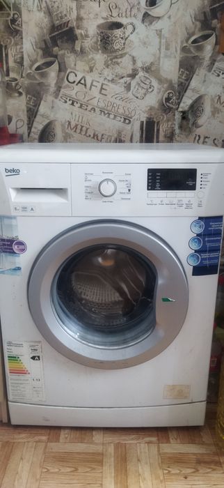 Стиральная машина в рабочем состоянии