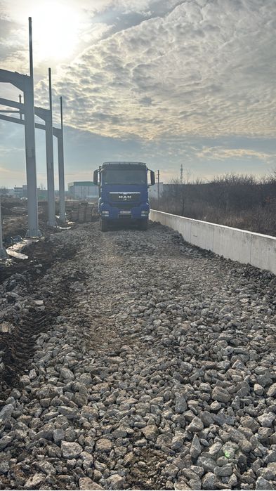 buldoexcavator basculante de inchiriat