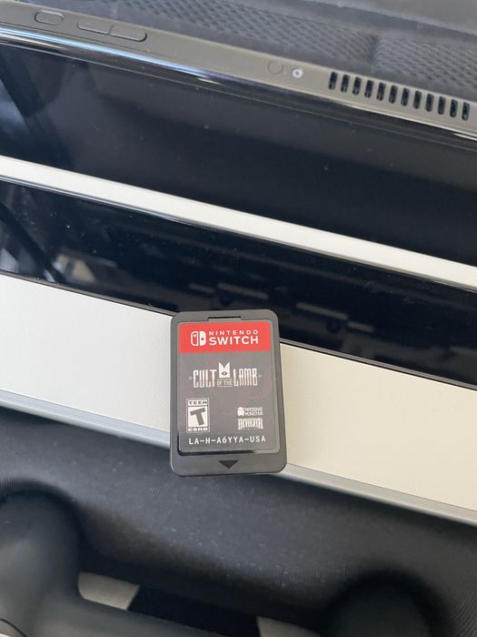 NINTENDO SWITCH Oled gen 1 in stare perfecta +jocul Cult of the Lamb