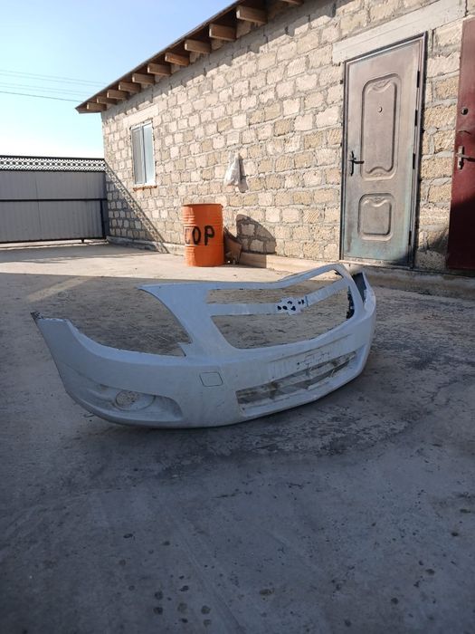 Передний бампер Шевроле кобальт