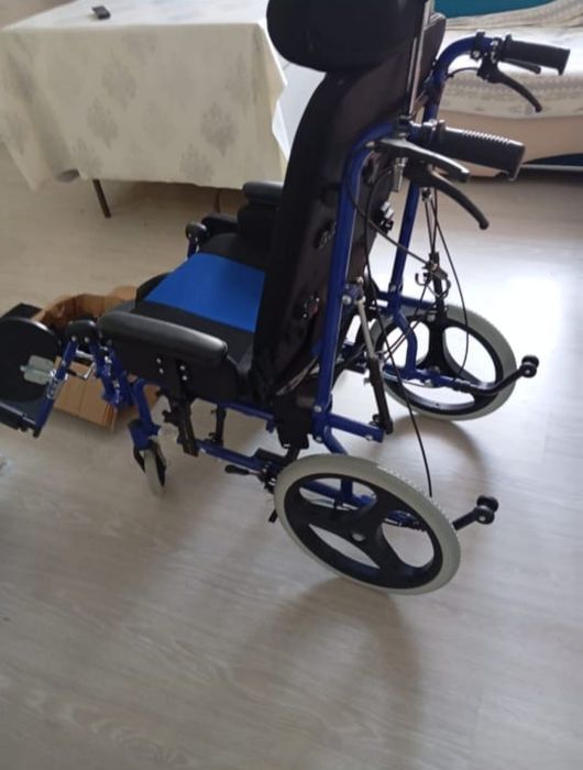 Многофункциональная инвалидная коляска