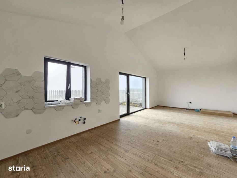 Casa individuala cu patru camere pe parter P+M, teren 400mp