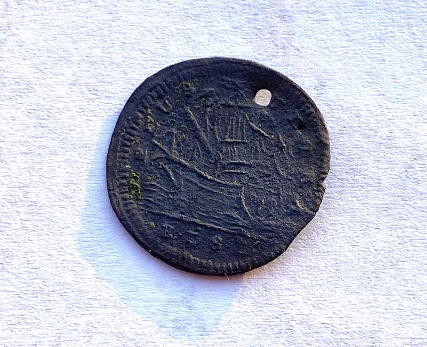 Moneda veche din bronz