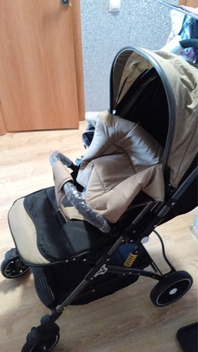 Прогулочная коляска откидная ручка