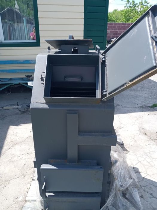 Котёл длительного горения Механик