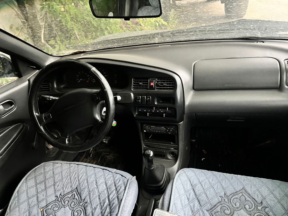 Мазда 323 в аварийном состоянии