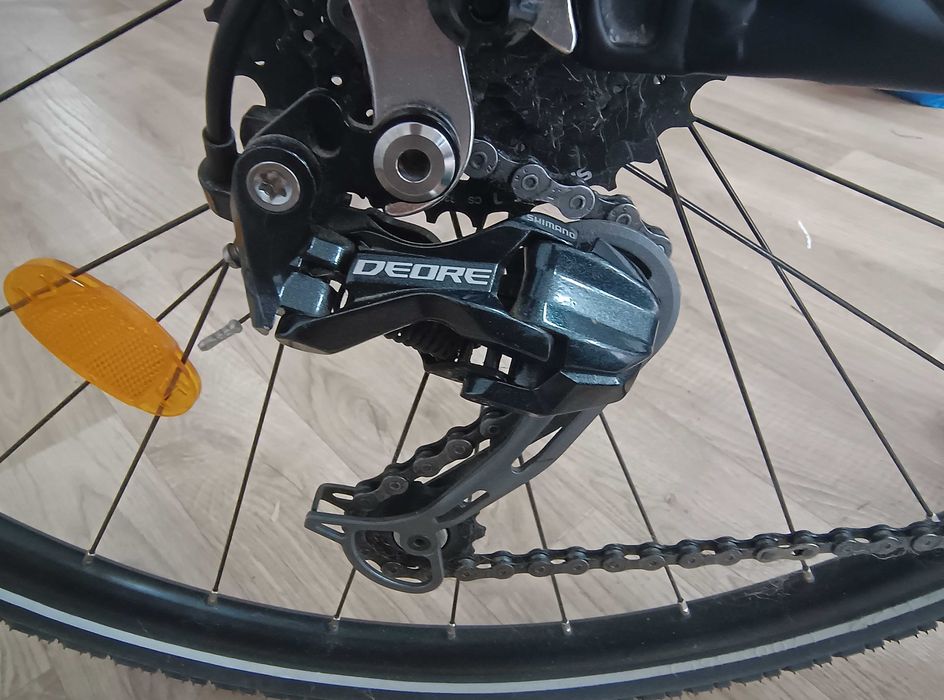 Bicicleta trekking Romet Orkan 4 M L/21 - Culori negru/rosu - Stare foarte buna