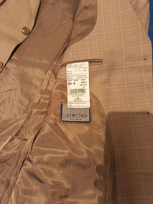 Продам костюм новый