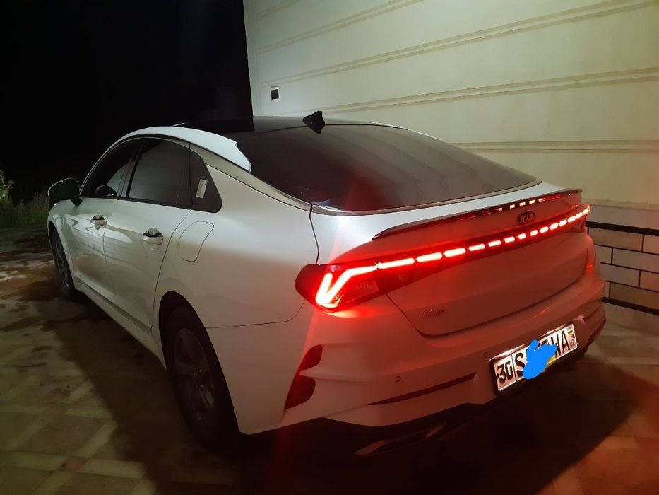Kia k5 2021 beliy jemchug