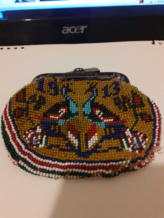 Старо портмоне на 112 години