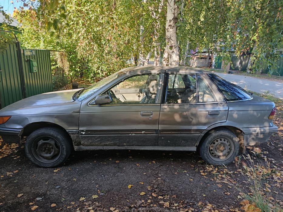 Продам Mitsubishi Lancer 1991год