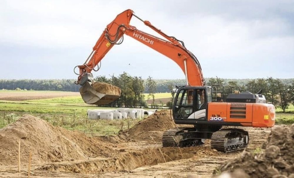 Гусеничный экскаватор + гидромолот