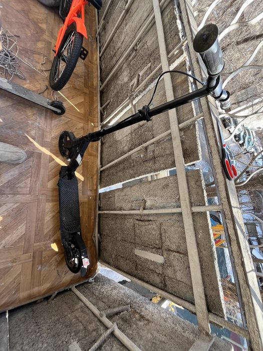 Продам самокат Roces 200.