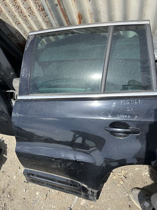 Задна лява врата Vw Tiguan 2008-14год с лека забележка