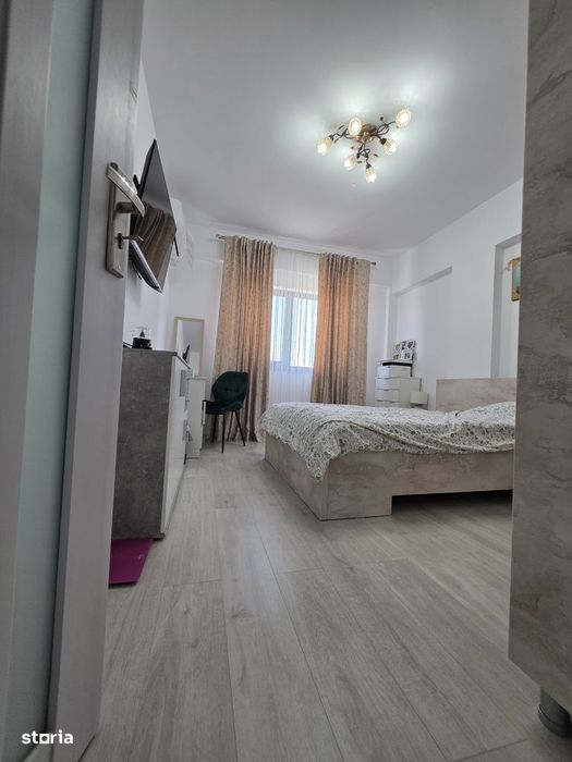 Apartament in bloc nou,mobilat, parcare proprie.
