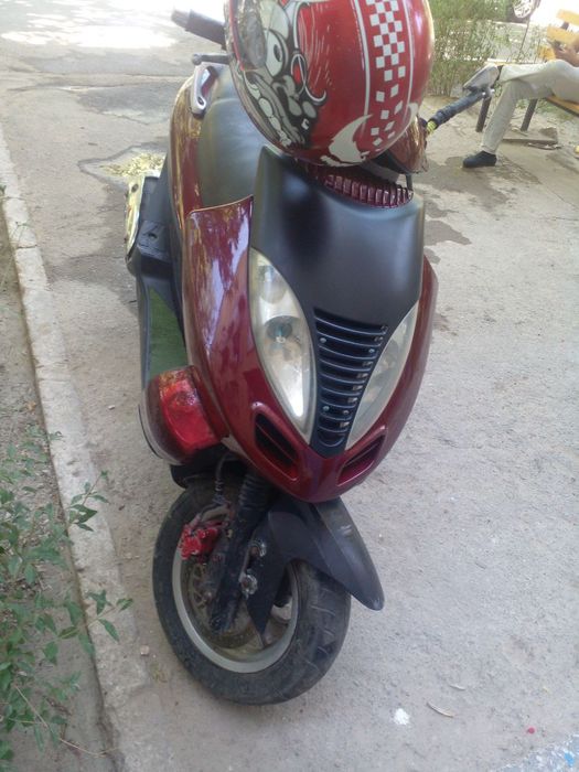 Продается скутер  Kymco bet&win 150
водное охлаждения
Объем цил