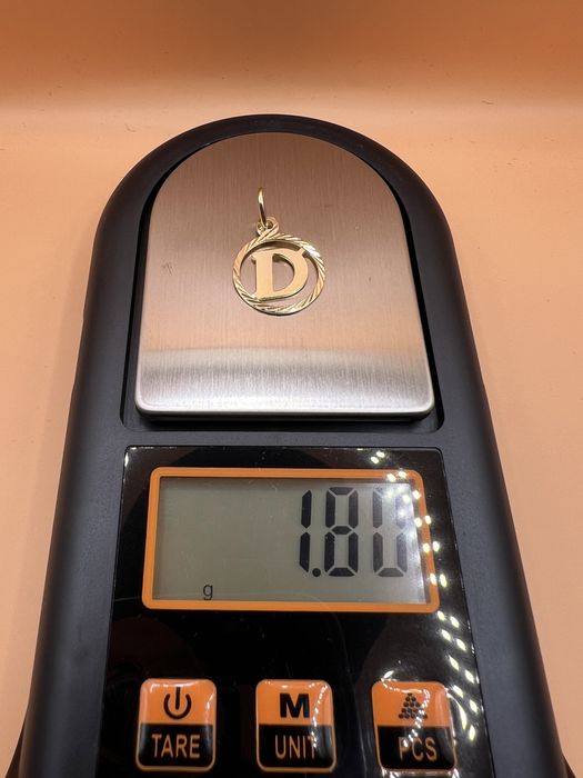 Продам золотой кулон.