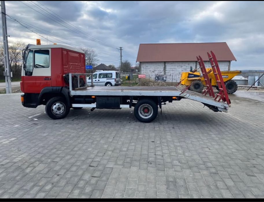 Vand sau schimb man8.163 autoplatforma utilaje