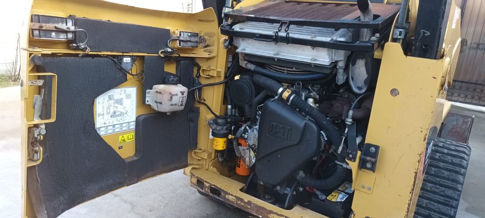 Miniincarcator bobcat ,incarcator frontal Caterpillar