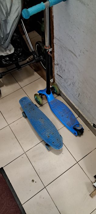 Тротинетка със скейборд