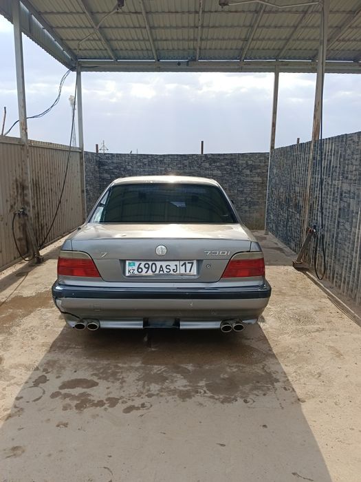 Бмв семёрка автомат