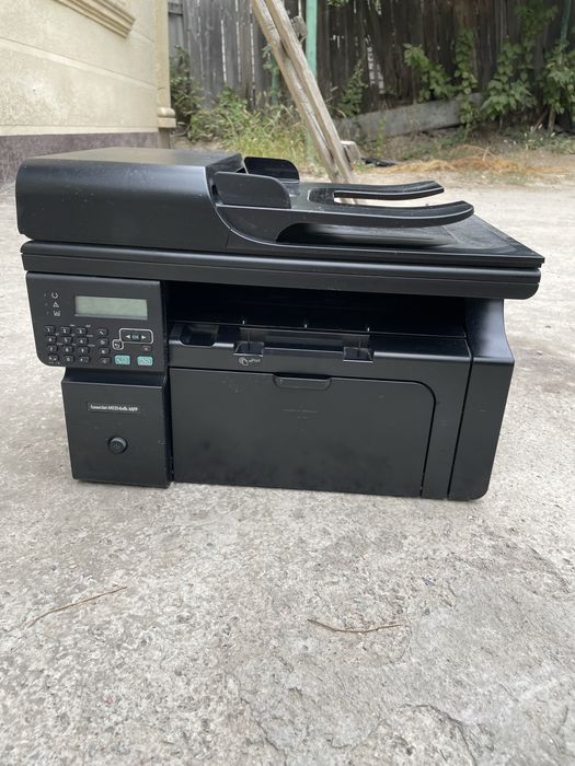 Принтер HP LaserJet M1214nfh MFP.