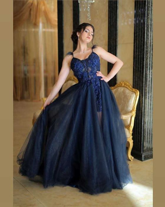 Дизайнерска рокля размер М за повече инфо на лични