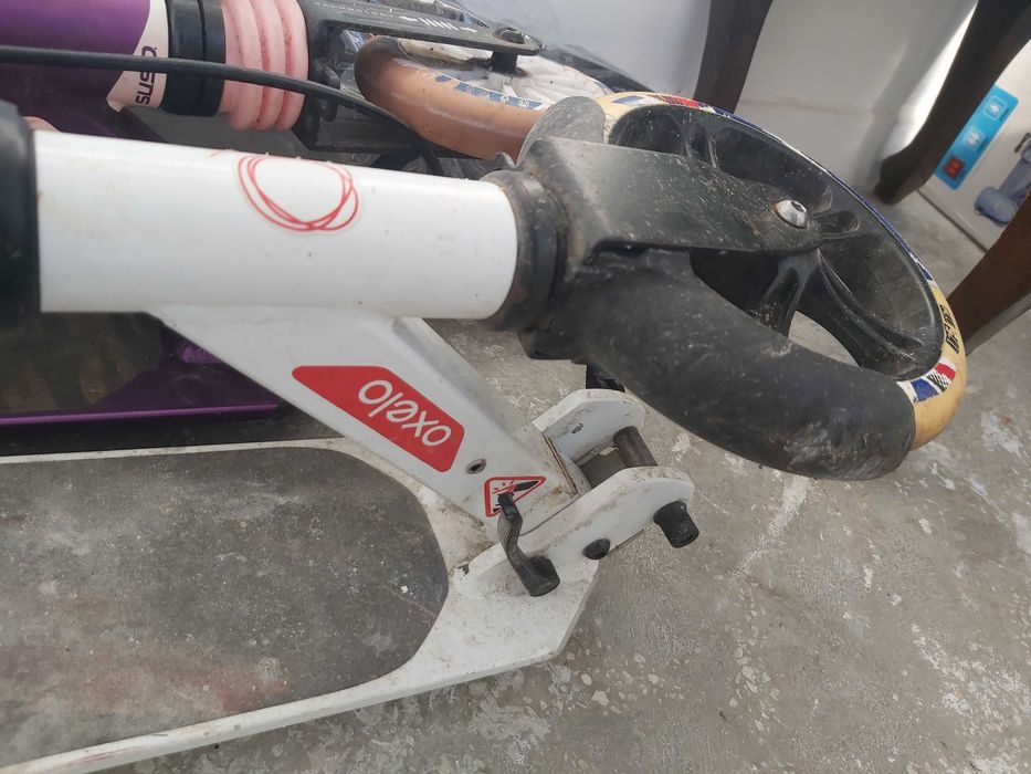 Trotineta Oxelo (utilizata) culoare alb si roti pe 175mm