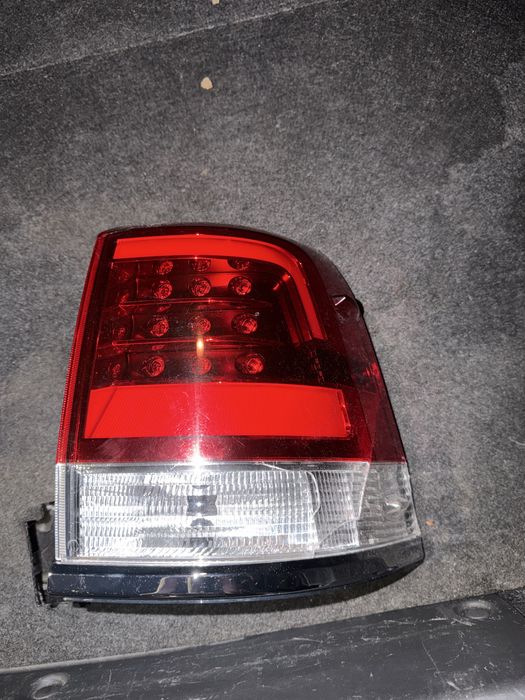 Фонарь задний на крыло TLC 200