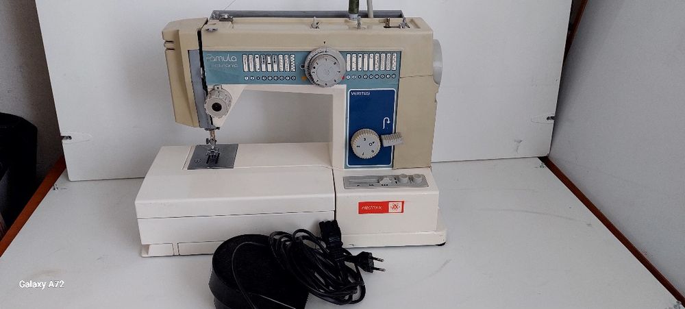 Masina. cusut  gritzne.  Ricaccar Graifar rotativ. Și singer 8280.