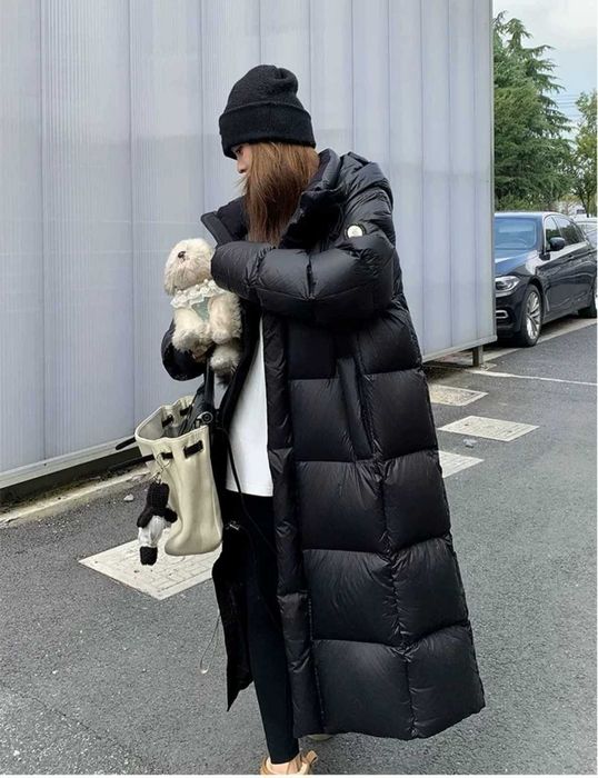 Продам пуховик , ниже колена , новый