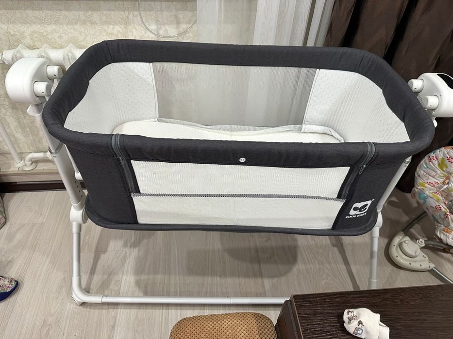 Детская кроватка с маятниковым приводом