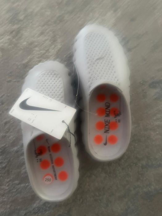 Продам тапочки Nike Mind 001