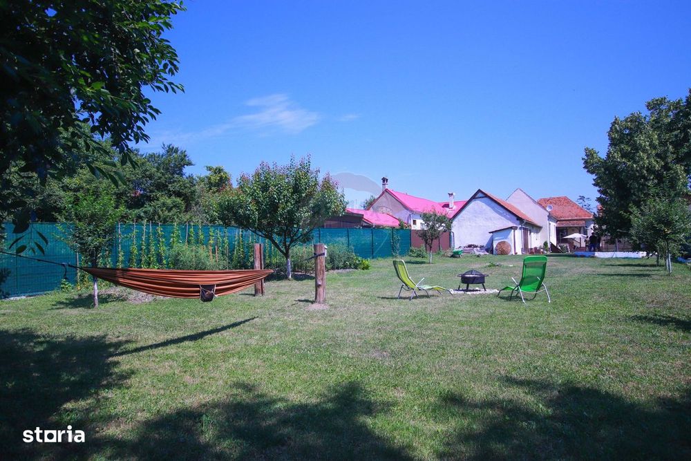 Proprietate rară în Măieruș: teren 1.123 mp, casă, garaj și anexe