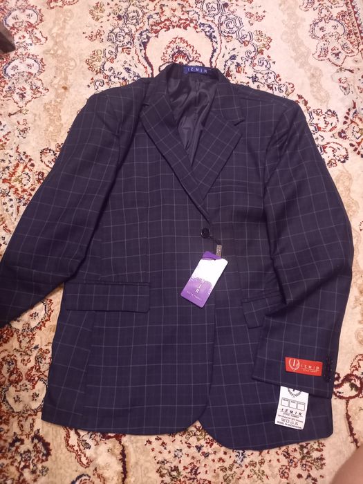 Продам мужские костюмы