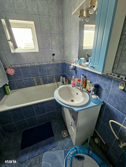 Apartament 4 camere,2 bai ,balcon ,Centru Beclean