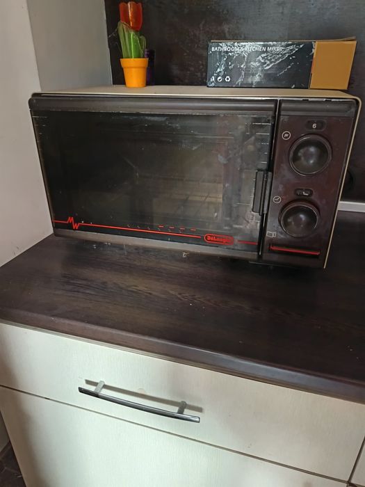 Микровълнова печка Делонги само за 20 евро