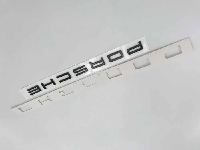 Emblema PORSCHE negru spate