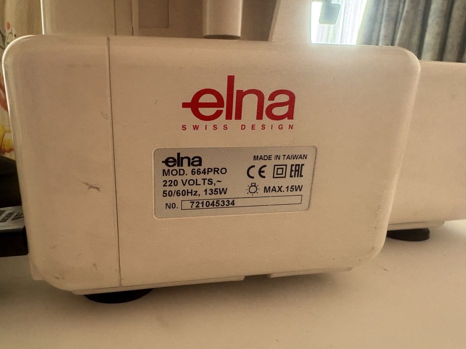 Janome оверлок elna